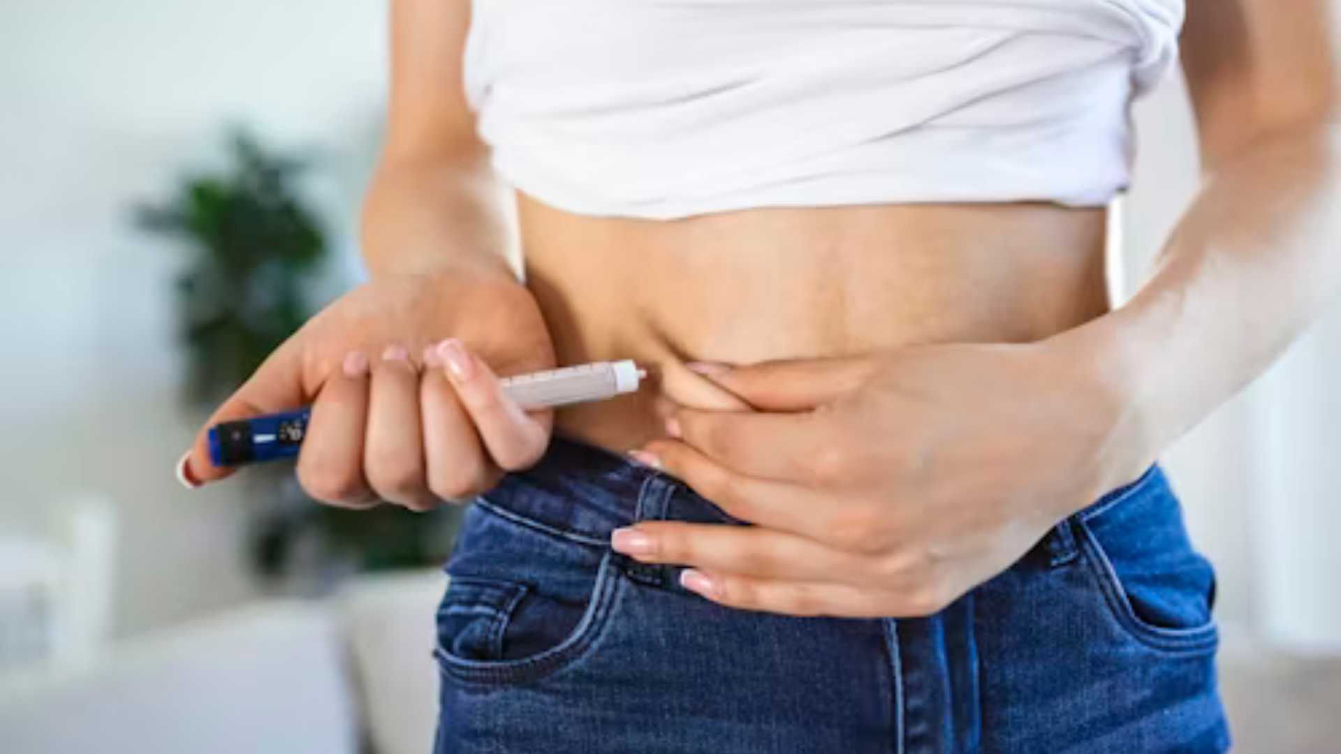 Woman sleeping peacefully at night because good sleep supports Metabolism After 30 and weight loss.